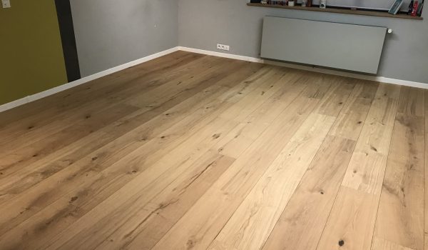 Pose de parquet en bois massif